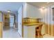 Hallway with tiled floor, built-in cabinets with counterspace, and neutral paint at 895 S Gulfview Blvd # 309, Clearwater Beach, FL 33767