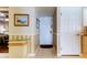 Inviting entrance hall with decorative wainscoting and ceramic tile flooring at 895 S Gulfview Blvd # 309, Clearwater Beach, FL 33767