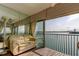 Waterfront condo with seating and water view from the living area at 895 S Gulfview Blvd # 309, Clearwater Beach, FL 33767