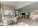 Spacious condo layout showcasing the dining and living area with bright sunlight at 895 S Gulfview Blvd # 309, Clearwater Beach, FL 33767
