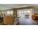 Living room with water views and comfortable seating at 895 S Gulfview Blvd # 309, Clearwater Beach, FL 33767