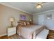 A main bedroom with hardwood floors, soft lighting at 895 S Gulfview Blvd # 309, Clearwater Beach, FL 33767