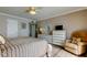 A main bedroom with hardwood floors, soft lighting at 895 S Gulfview Blvd # 309, Clearwater Beach, FL 33767