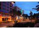 Charming street view featuring a lively storefront, palm trees, and appealing architecture at 895 S Gulfview Blvd # 309, Clearwater Beach, FL 33767