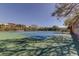 Community tennis courts with pristine blue and green surfaces, surrounded by trees and a well-kept fence at 895 S Gulfview Blvd # 309, Clearwater Beach, FL 33767