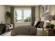 Inviting main bedroom with ample natural light, plush bedding, and modern furnishings at 9340 Gladsome Dr, Land O Lakes, FL 34637