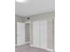 Bedroom with new carpeting and closet with sliding doors at 10426 109Th St, Seminole, FL 33778