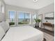 Bright bedroom with natural light and scenic water views from multiple windows at 1162 Tookes Rd, Tarpon Springs, FL 34689