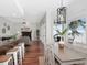 Open concept dining room offering lake views and an island bar at 1162 Tookes Rd, Tarpon Springs, FL 34689