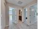 Hallway showcasing access to a bedroom, bathroom and a loft area at 11828 Miracle Mile Dr, Riverview, FL 33578