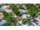 An aerial perspective of a residence nestled among many other homes at 15204 Westminister Ave, Clearwater, FL 33760