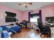 Bedroom with hardwood floors, lots of light, and a work space at 15204 Westminister Ave, Clearwater, FL 33760