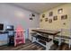 Cozy dining area with wood benches and rustic table, perfect for Gathering meals at 15204 Westminister Ave, Clearwater, FL 33760