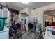 Laundry room featuring stainless steel appliances and tile floor at 15204 Westminister Ave, Clearwater, FL 33760