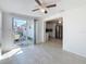 Bright dining area with sliding doors leading to the patio, next to the kitchen at 2122 Holiday Dr, Holiday, FL 34691