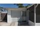 Attached one car garage provides convenient parking and storage at 2122 Holiday Dr, Holiday, FL 34691
