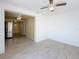Open concept living and kitchen area with modern flooring and lots of natural light at 2122 Holiday Dr, Holiday, FL 34691