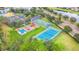 Overhead image of the community park, featuring playgrounds, tennis and basketball courts at 2218 132Nd E Pl, Parrish, FL 34219