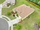 Lovely home showcasing lush landscaping, a well-manicured lawn, and a spacious driveway, enhancing its overall charm at 2218 132Nd E Pl, Parrish, FL 34219