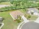 Charming home with beautiful landscaping, a lush green lawn, and a spacious driveway for convenience and curb appeal at 2218 132Nd E Pl, Parrish, FL 34219