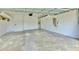 Spacious two car garage with ample storage space; ready for your vehicles and hobbies at 2218 132Nd E Pl, Parrish, FL 34219