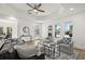 Spacious living room with hardwood floors and view of a furnished front porch at 2328 Dartmouth N Ave, St Petersburg, FL 33713