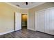 Bedroom features a walk-in closet and neutral paint, creating a serene retreat at 263 Alexander Woods Dr, Plant City, FL 33563