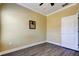 Bedroom featuring a ceiling fan, neutral walls, crown molding, and modern floors at 263 Alexander Woods Dr, Plant City, FL 33563