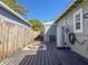 This home has an inviting backyard with a wooden deck, a charming fire pit, and an external hot water heater at 2869 36Th N Ave, St Petersburg, FL 33713