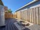 The backyard has a fire pit, wooden deck and an exterior hot water heater at 2869 36Th N Ave, St Petersburg, FL 33713