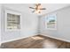 Bright bedroom featuring updated flooring, fresh paint and lots of natural light at 2869 36Th N Ave, St Petersburg, FL 33713