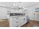 Modern kitchen with sleek cabinets, marble countertops, and stainless-steel appliances at 2869 36Th N Ave, St Petersburg, FL 33713