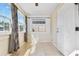 Cozy sunroom with multiple windows and tile flooring at 2869 36Th N Ave, St Petersburg, FL 33713