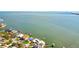 An aerial view of waterfront homes with private docks on the bay at 2970 68Th S Ave, St Petersburg, FL 33712