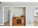 Bar area with custom wine rack and mosaic tile wall at 2970 68Th S Ave, St Petersburg, FL 33712