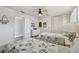 Bright bedroom features twin beds with ocean-themed quilts, plus shuttered windows and closet at 2970 68Th S Ave, St Petersburg, FL 33712