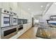 Modern kitchen featuring stainless steel appliances and granite countertops at 2970 68Th S Ave, St Petersburg, FL 33712
