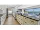 Modern kitchen featuring a large island and stunning water views at 2970 68Th S Ave, St Petersburg, FL 33712