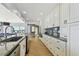 Gourmet kitchen with stainless steel appliances and granite countertops at 2970 68Th S Ave, St Petersburg, FL 33712