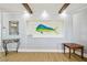 Living room with wood beam ceiling and niche with custom fish art at 2970 68Th S Ave, St Petersburg, FL 33712