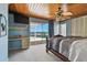 Main bedroom with water view, wood ceilings and slider to pool at 2970 68Th S Ave, St Petersburg, FL 33712