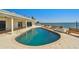 Backyard pool and patio with water views, perfect for summer fun at 2970 68Th S Ave, St Petersburg, FL 33712