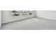 Bright bedroom with lake views from many windows and carpet flooring at 31651 Westbury Estates Ave, Wesley Chapel, FL 33545