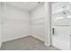 Bright walk-in closet featuring wire shelving and rod, offering plenty of storage space at 31651 Westbury Estates Ave, Wesley Chapel, FL 33545