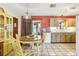 Eat-in kitchen with tiled floors and lots of light, perfect for Gathering meals at 33357 Westwood Dr, Ridge Manor, FL 33523