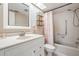 Clean bathroom featuring a bathtub, shower, vanity, and ample lighting providing functionality and comfort at 3610 Magnolia Ridge Cir # 1322/H, Palm Harbor, FL 34684