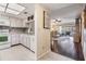 Bright kitchen that opens to the living room with a breakfast bar, perfect for entertaining Gathering and friends at 3610 Magnolia Ridge Cir # 1322/H, Palm Harbor, FL 34684
