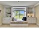 View of a window seat with built in shelving and drawers at 367 Bobby Jones Rd # 367, Sarasota, FL 34232