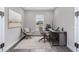 Bright office space with modern desk, chair, neutral color palette, and natural light at 4787 Majestic Hills Loop, Brooksville, FL 34601
