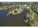 Beautiful aerial shot showcasing the community's ponds, lush greenery, and walking paths at 5409 Conch Shell Pl, Apollo Beach, FL 33572